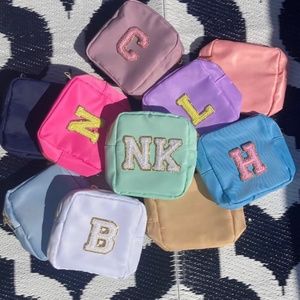 Nylon pouch with varsity letter